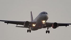 Slow Motion Video Closeup of an Airplane in Flight