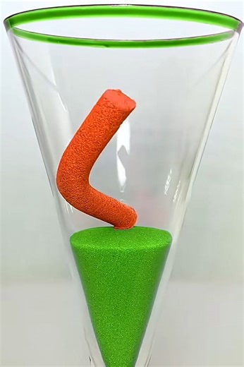 Unique Sand Shape Balanced in Green Cone