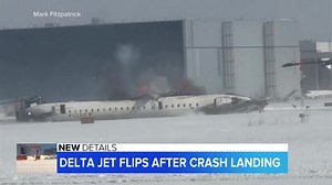 DELTA JET FLIPS UPSIDE DOWN AFTER CRASH LANDING: A Delta plane crashed while trying to land in Toronto, leaving 18 people injured. ABC's Lionel Moise has firsthand accounts and video from those who escaped the plane while buckled up, upside down. | World News Now