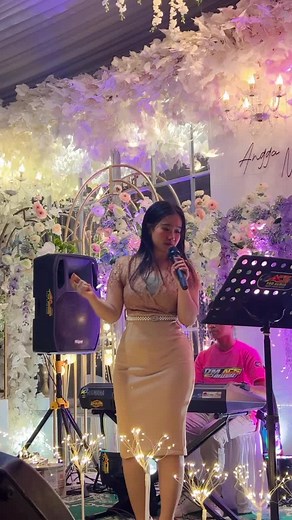 Musical Performance by Female Singer in Elegant Setting