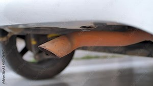 The car exhaust pipe emits carbon monoxide. Exhaust fumes from internal combustion engines cause pollution