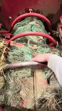 Removing the net wrap on the Highline bale processor