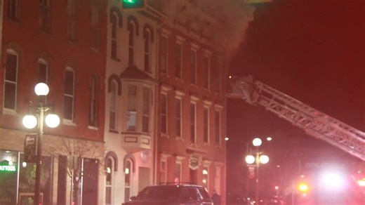 Ashton Peters of Flash & Sirens of Clinton County, PA LLC captured crews from multiple companies battling a third-floor structure fire Sunday night at 136 E. Water St. in Lock Haven that caused extensive damage, displaced residents, and remains under investigation, with no injuries reported. | NorthcentralPa