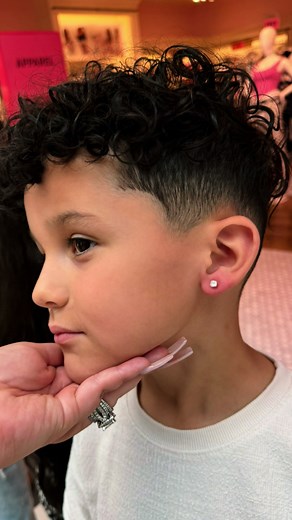 Adorable Ear Piercing Experience: A Tough Little Man's Journey