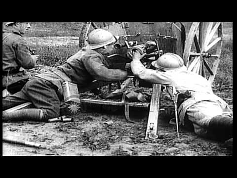 Soldiers fire 37 mm trench cannon in France. HD Stock Footage