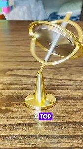 Spinning a top within a top 😲 #science #PhysicsIsFun #education #mindblowingfacts #spinning #reels | The Action Lab