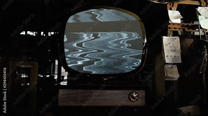 Old 60s Television with Green Screen Explodes in an Antique Shop. Zoom In. You can replace green screen with the footage or picture you want. You can do it with “Keying” effect in After Effects .