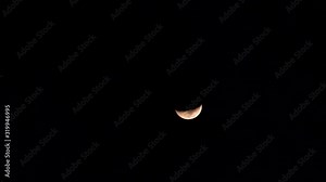 Time lapse footage of last quarter moon moving from up to bottom at night, 4k video, b roll shot.