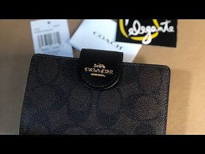 Authentic Coach signature PVC Medium Corner zip bifold wallet black brown