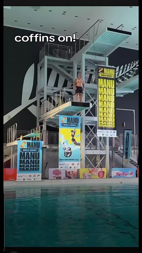 Exciting High Dive Performance in Indoor Pool