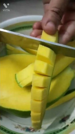 Raw mango slices with chili powder and salt