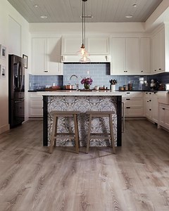 Enjoy the look of real wood with low-maintenance, beautiful vinyl flooring. | The Home Depot