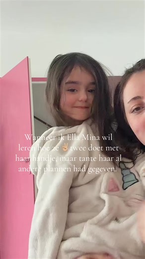 Teaching Ella Mina Two-Finger Peace Sign