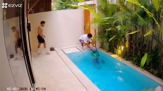 Deliveryman takes unexpected plunge into pool in Bali, Indonesia