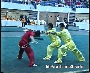 8.8K views · 308 reactions | 7th World Wushu Championships Men's Duilian Shuangdaojinqiang (double broadsword/saber versus spear) Zhao Qingjian Yi Peng Wei Jian (China) Credit to cwushu channel on youku.com. | Jiayoo Wushu | Facebook