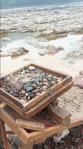Riverbed Mining: Sifting Stones with a Traditional Rocker Box