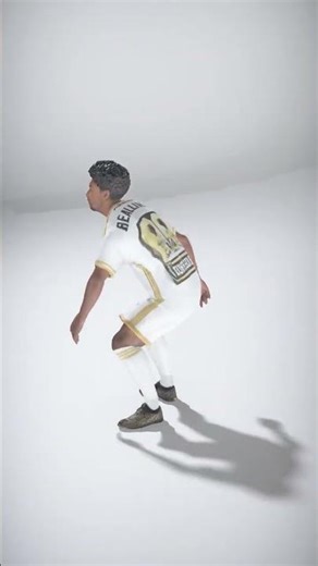 Soccer Player in White and Gold Uniform