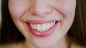 clip-1083850225-montage-happy-smiling-diverse-people-close-up-smiles