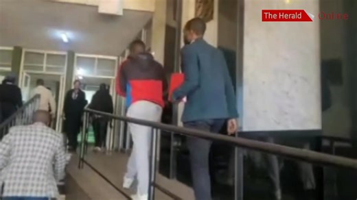 The alleged mastermind behind the recent US$500 000 robbery at a Harare CBD shop owned by former Zimbabwe Warriors team manager and Dynamos chairman, Rafiq Adam, 35-year-old Samson Gora arrives at the Harare Magistrates Court. 📹: Lee Maidza | The Herald-Zimbabwe
