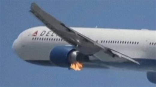 Engine of Boeing passenger plane bursts into flames during take-off