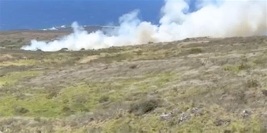 Maui firefighters gain control of wind-driven brush fire as evacuees wait to return home