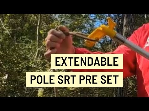 Using an extendable pole to put a climbing rope in a tree