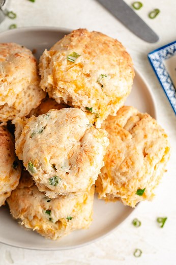 Learn how to make our soft, flaky cheddar scallion biscuits at home with this easy recipe! You'll need  2 cups self-rising flour ¼ cup cold unsalted butter 1 cup shredded sharp cheddar cheese ¼ cup finely chopped scallions or chives ¼ teaspoon salt ¾ to 1 cup cold buttermilk or whole milk ✅ Comment "link" and I'll send a link to this recipe to your DMs! | Berly's Kitchen | Facebook