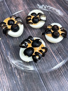 Jennys Spooky Spider Devil Eggs great Halloween side dish lets get started. 3 hard boiled eggs ( yolk separated) add to yolk : mayo, mustard, white pepper mix to a paste. black olives red & yellow food color Method as shown. ENJOY Do subscribe to my YouTube Channel follow me on fb and invite your friends to Jennys Wok. | Jenny’s Wok