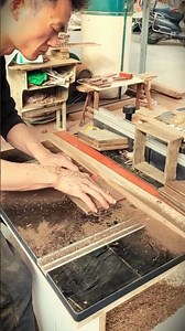 the process of smoothing the edges of small wooden planks to produce the desired shape #shorts