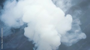 Dynamic wisps of white smoke swirl and billow, creating an ethereal, atmospheric effect with soft light.