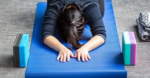 Yoga may help lessen symptoms of atrial fibrillation, like lowering high blood pressure, study says
