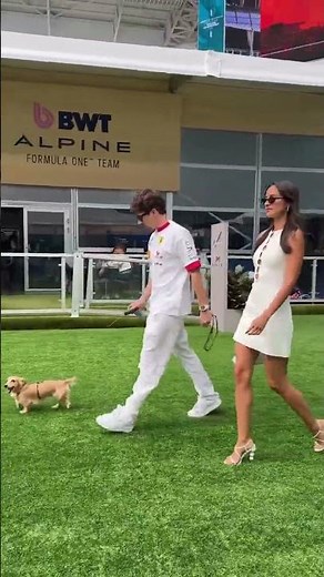 Just Charles Leclerc and his puppy Leo living their best life at the track!