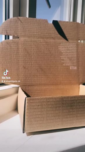 Unboxing a Colorful Rainbow Pop-It Toy