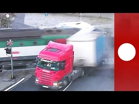 Passenger train smashes into truck at level crossing