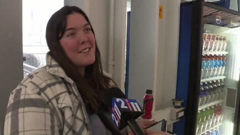 Travelers cope with flight delays, cancellations wrought by winter storm