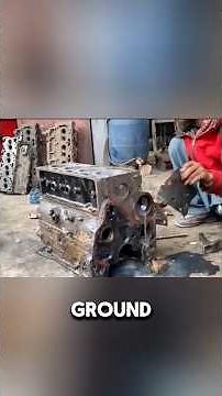 This Pakistani mechanic refurbishes an engine block.
