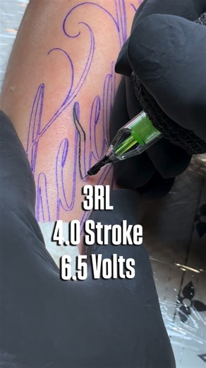 Chucky TATTOO ARTIST | ORANGE COUNTY on Instagram: "Doing this new “trendy” style of calligraphy tattoo. What do you think about this style? #tattooing #tattoovideo #tipsandtricks #scripttattoo #finelinetattoo #fineline #letteringtattoo #pov #closeup #tattooreels #customlettering #tattooworkers"