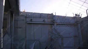 A check point in the security wall (separation wall) which divides Israel and Palestine. Palestinians must pass through these checkpoints to get to Israel.