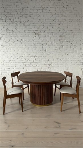 Extendable dining table made of solid walnut
