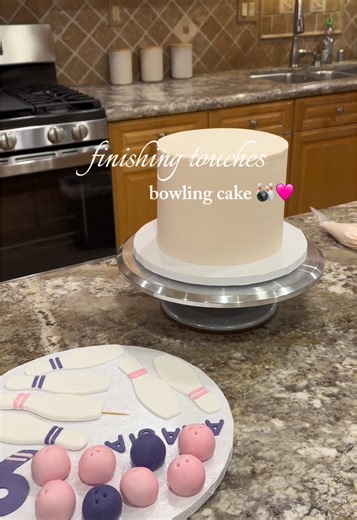 finishing touches ✨ this is my favorite part of the cake making process - decoratinggg!! this bowling cake was too cute 🥰🎳 using @Satin.Ice fondant, @AmeriColor food coloring 🫶🏼 #cakedecorating #bowlingcake #cake #aadesserts #fondantbowling