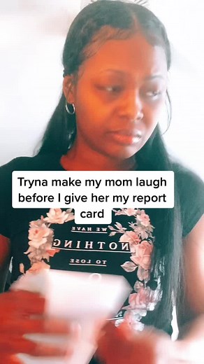 Making Mom Laugh with a Report Card Reveal