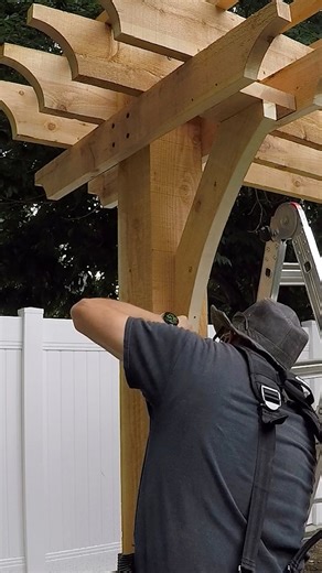 3.8K views · 25 reactions | Come along with us as we build an arbor with a swing. Here we are showing the step where we install curved diagonal brackets to the arbor swing. #selfbuild #woodworking #backyardgoals #BackyardOasis | Remodelaholic | Facebook