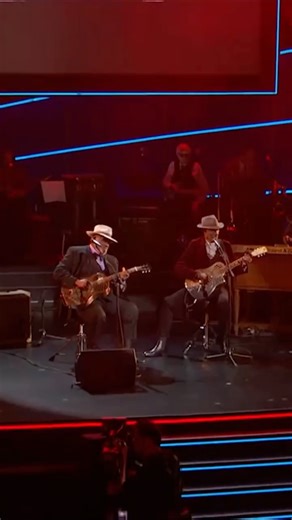 Taj Mahal on Instagram: "#ThrowbackThursday to 2018, and TajMo performing "Diving Duck Blues" together at the Grammy award ceremony. 🪕 Listen to TajMo's new album 'Room On The Porch' at the link in bio."