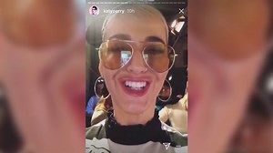 Katy Perry snuggles up to Micky and Minnie Mouse at Disneyland