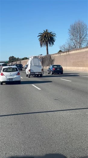 Christopher Skeeles on Instagram: "The 96 Ford Ranger camper truck, complete with garage door wrap around and solar panels on the hood. A+ for creativity.🤣"