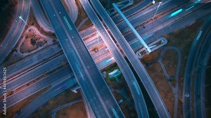 4K : Hyperlapse or Dronelapse Top view of Highway road junctions. The Intersection freeway road overpass the eastern outer ring road. Time lapse Aerial view