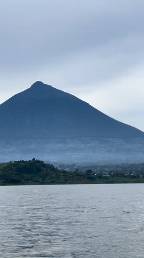16 reactions | Adventure in elegance — gaze over the Twin Lakes as the Virunga Mountains rise beyond the mist. Where every view feels like pure luxury in the wild. A boat excursion on the Twin lakes is the perfect combination with Gorilla or Golden monkey trekking. DM To Book your Rwanda  escape today. #LuxuryAdventure #GetawayExpedition #VisitRwanda #VirungaMountains #TwinLakes. | Getaway expedition | Facebook