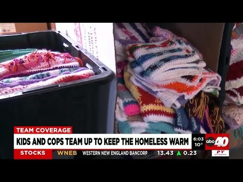 Kids and cops team up to keep the kids warm