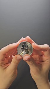 A bold, vivid sugar maple leaf, Canada's national emblem and the...