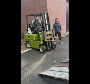 Driving Forklift Up a Trailer Ramp